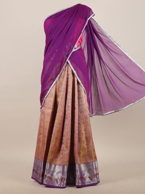 Pothys - A stylised version of the readymade #lehenga in the half saree  pattern featuring a midnight blue #choli with bold leaf embroidery, a silk  lehenga in warm peach with gold buttas